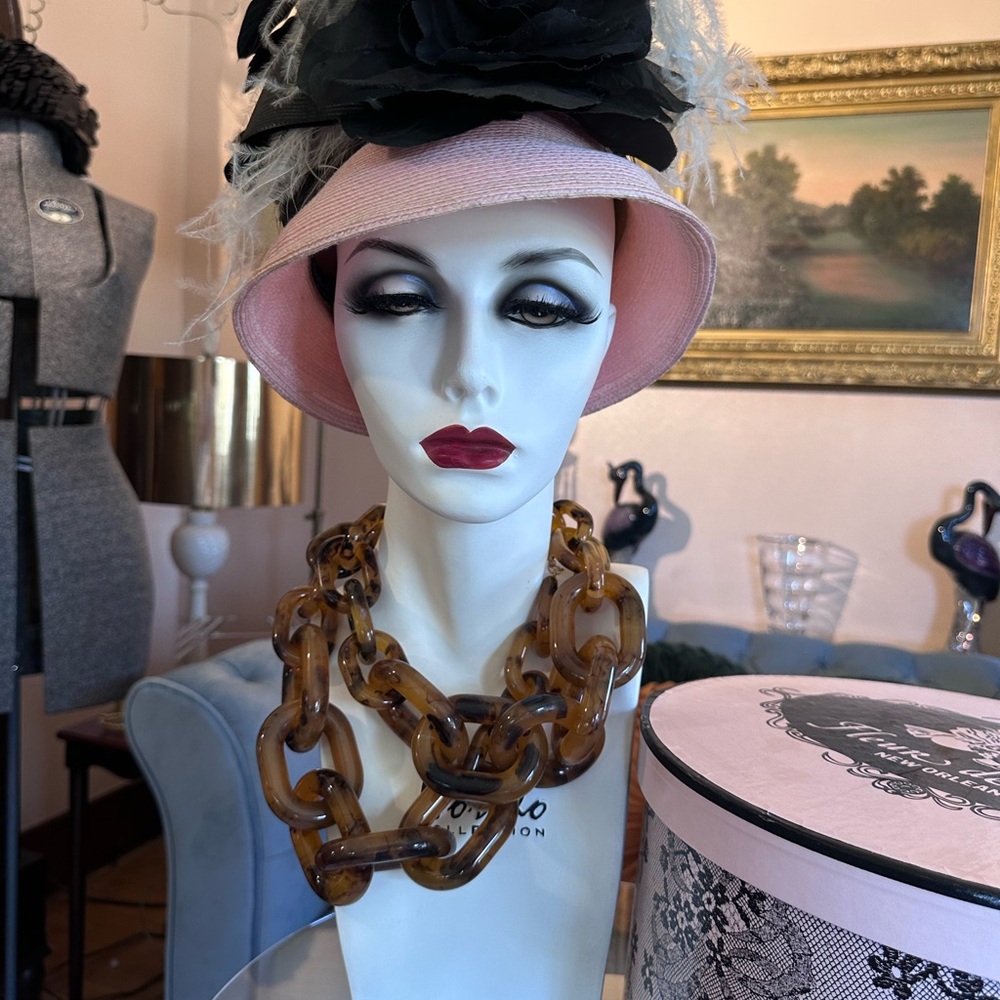 Fleur de Paris in New Orleans.. Pink Hat with Black Floral Accent Amazing!
